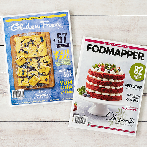 Australian Gluten-Free Life magazine with gluten-free blueberry tray cheesecake and FODMAPPER magazine with low FODMAP red velvet cake on cover.