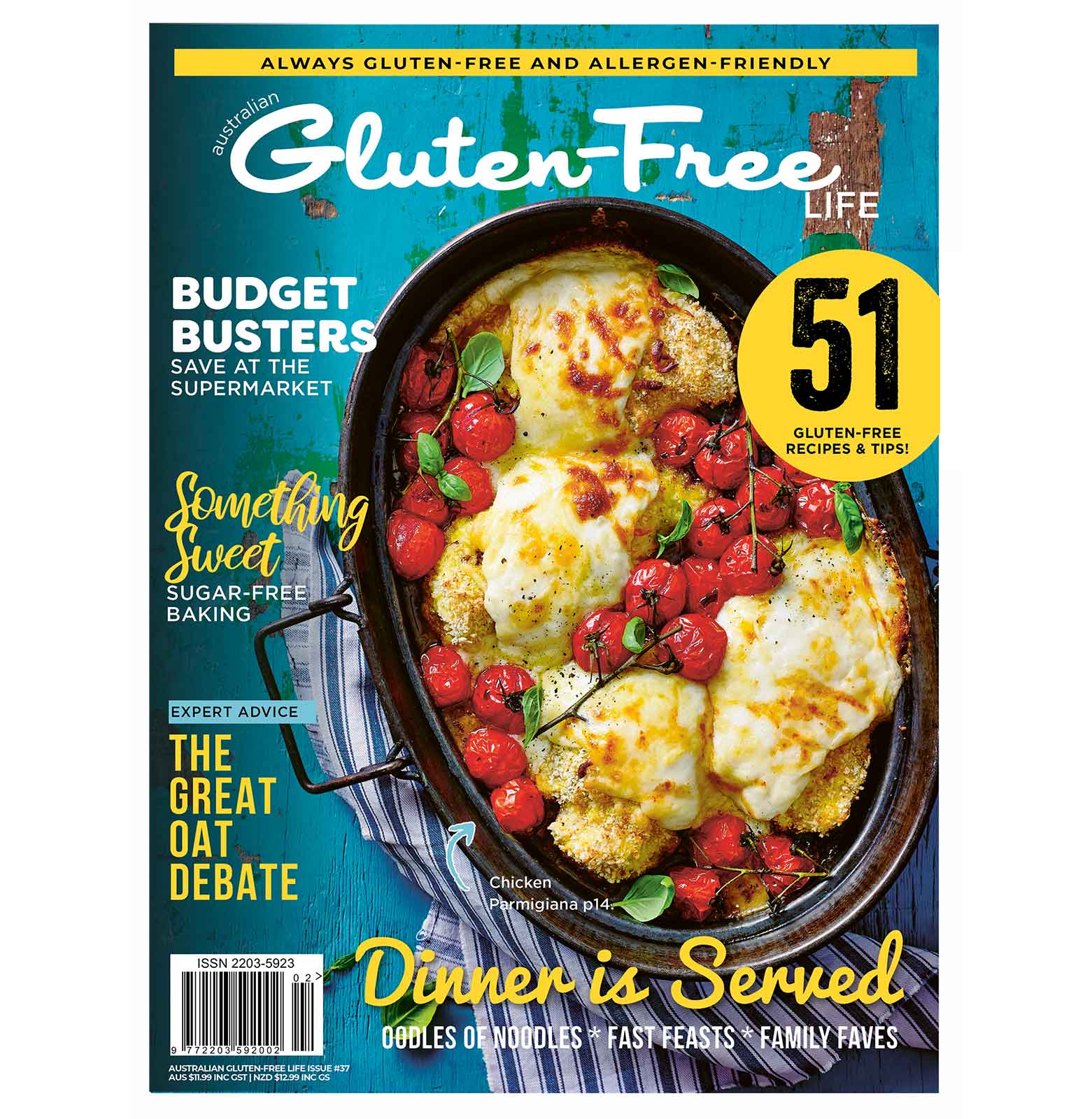 Cover of Australian Gluten-Free Life magazine issue 37 with an oval-shaped cast iron dish on the cover with four pieces of gluten-free chicken parmigiana, truss cherry tomatoes and fresh basil leaves inside. The dish is sitting on a blue and white striped cloth.