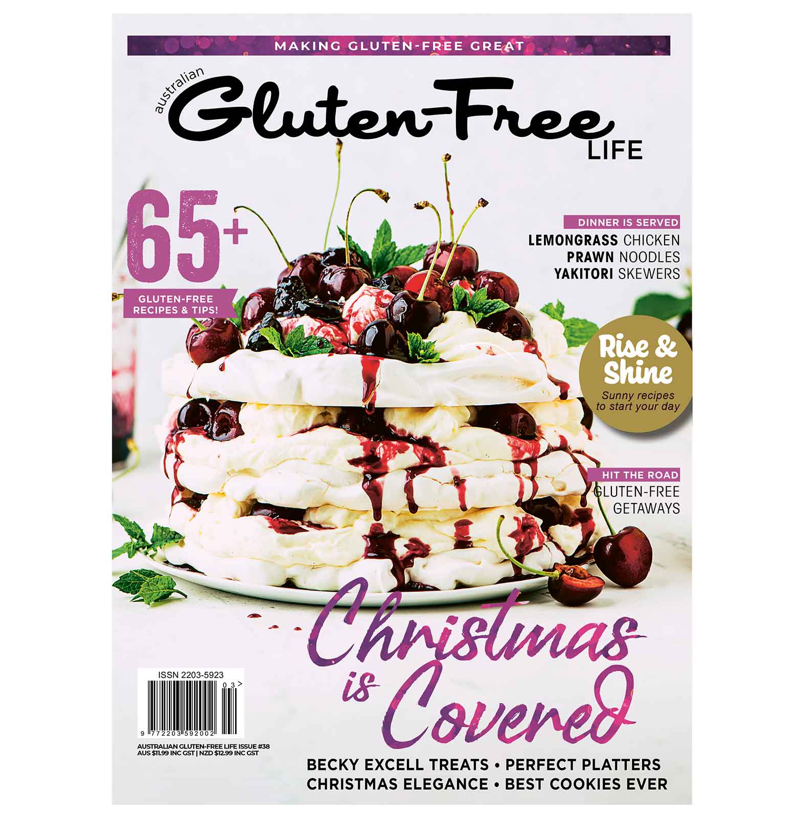 The cover of issue 38 of Australian Gluten-Free Life magazine featuring a three layered pavlova with fresh cherries drizzled with cherry sauce on a white plate. Cover lines include gluten-free getaways, rise and shine breakfast recipes, dinner is served lemongrass chicken, prawn noodles and yakitori skewers.